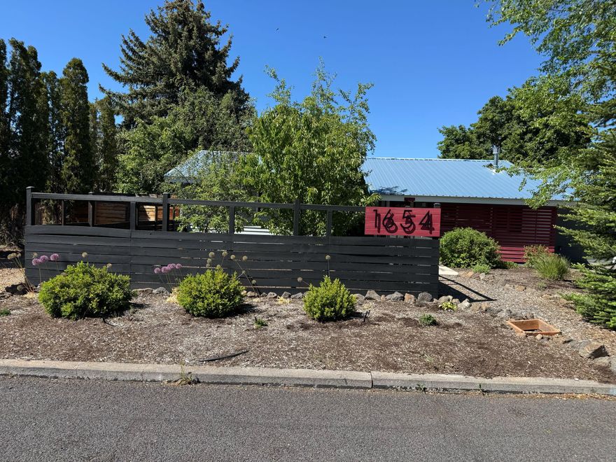 Discover this charming single-level home on a large lot, offering ample space and privacy. Featuring 2 bedrooms and 1 bathroom, the open layout is bright and inviting. The updated kitchen adds modern style and convenience, while a gas fireplace creates a cozy atmosphere. The property includes a single-car garage, a carport, and a dedicated spot to park your RV, perfect for travel lovers. The spacious lot provides plenty of outdoor space for gardening, entertaining, or relaxing in nature. Whether you're starting fresh or downsizing, this versatile home combines comfort, style, and practicality in a desirable setting.