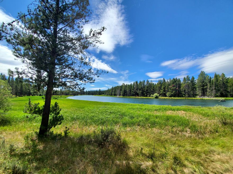 Location is everything! Sweeping Deschutes River views both upstream and downstream with no pathway between the home and the river. Siskin Lane is one of the most desirable streets within Sunriver Resort. Comfortable reverse living floor plan with soaring ceilings and lots of windows to take advantage of the one of a kind views. A large upper deck runs the length of the home. Below is a paving stone patio and a hot tub with views of the river. A large Master Suite with office/reading room and a walk-in closet. The guest rooms are comfortably sized. The driveway is newly paved and front entry has been updated. Riverfront homes don't come on the market often and homes on Siskin Lane even less often. Schedule a private showing today.