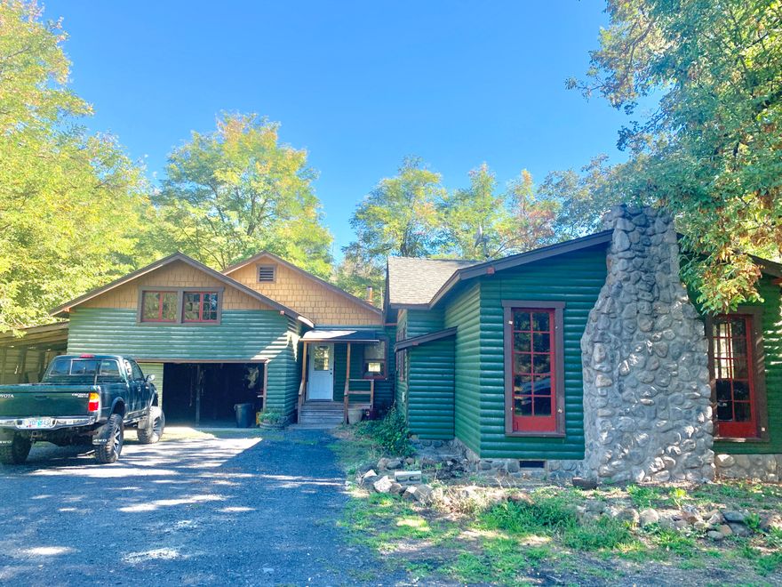 Two homes on over 20 acres! So many notable features! Water rights from slate creek, gravity fed spring water, super fast Star Link internet, covered horse corral with private riding trails, two ponds, two 40 foot insulated shipping containers with power! Original home is 1914 and has 2 bed 1 bath with 2 additional bedrooms above the garage, second home is a 1997 manufactured home 3 bed 2 bath.  both septics have been pumped and we have home inspection and water tests on hand. Act fast! All information is deemed correct but buyer to do due diligence in the condition and uses of this property