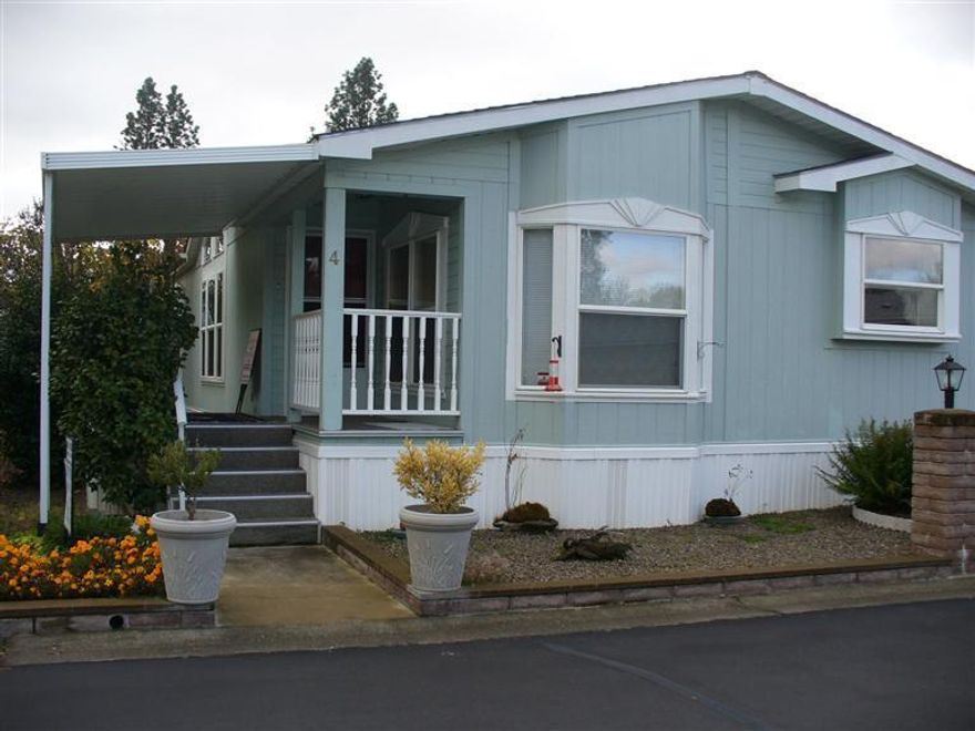 Nice clean home in 55+ park. What a great park to live in plus you can fish and enjoy the Rogue River to your hearts content. This home has been very well maintained. In the past year it received a new roof, awning and block work in back. Ready to move in and put your feet up!