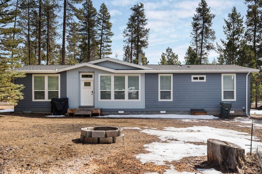 Nearly new home on 1.30 acres in the quiet Forest View neighborhood of La Pine. Entering the beautiful 1,620 sqft space, you'll quickly notice many great features including a large and open family room, dining, and kitchen area with Hickory cabinets, farm sink, high end appliances, tile backsplash, and a kitchen island with seating for 3. The living room has a wood burning fireplace, large windows, stylish light fixtures and ceiling fans. Enjoy the nice soaking tub, shower and walk in closet in the primary suite, or spread out in 1 of 2 additional bedrooms, complete with large closets and a shared bathroom. Outside of the house features a spacious lot with a circular driveway, well-built 24 x 36 shop with 14 foot RV door. storage shed and large wooden deck to sit and soak up the sun on warm summer days. There's even RV hookups in place for when your friends and family come to visit! With too many great features to list, call your broker today to schedule a time to tou