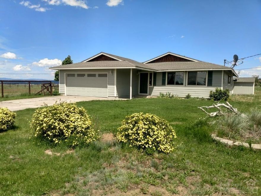 Almost 5 acres in Powell Butte with Cascade Mountain views, under $400k! This property is conveniently located in Powell Butte and is within 30 minutes of Prineville, Redmond and Bend. The seller has installed brand new siding and vinyl windows. Interior has been freshly painted in a farmhouse grey. Some fencing is in place, making this the perfect location for your horses. Owner friendly CC&R's (see attached). This one has a lot of potential with a few updates. Owner will carry terms with a significant down payment.