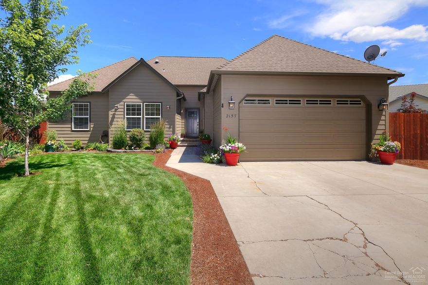 Entertainer's dream in a great NW Redmond neighborhood. Single level, Open, great room layout w/high end finishes & industrial touches. Soaring vaulted ceilings, exposed beams, lg rooms & closets, huge master w/vaulted ceilings, sitting area, double head tiled shower, walk in closet. Wood, carpet & tiled floors. Concrete, granite & tiled counters, Brazilian slate, premium finishes. Multi level deck, paver patio, pergola, hot tub & huge fenced back yard w/picture perfect landscaping. Private den/office.