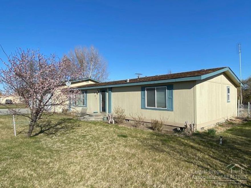 This breathtaking property is private yet close to town and the highway. Current owner keeps horses and there is an area for fruit trees & chickens. If the 3 car garage isn't enough space then the 925 sqft shop/barn will give you plenty. The home is well maintained with remodeled bathrooms and a gar range in the kitchen. A true must see before it's gone!