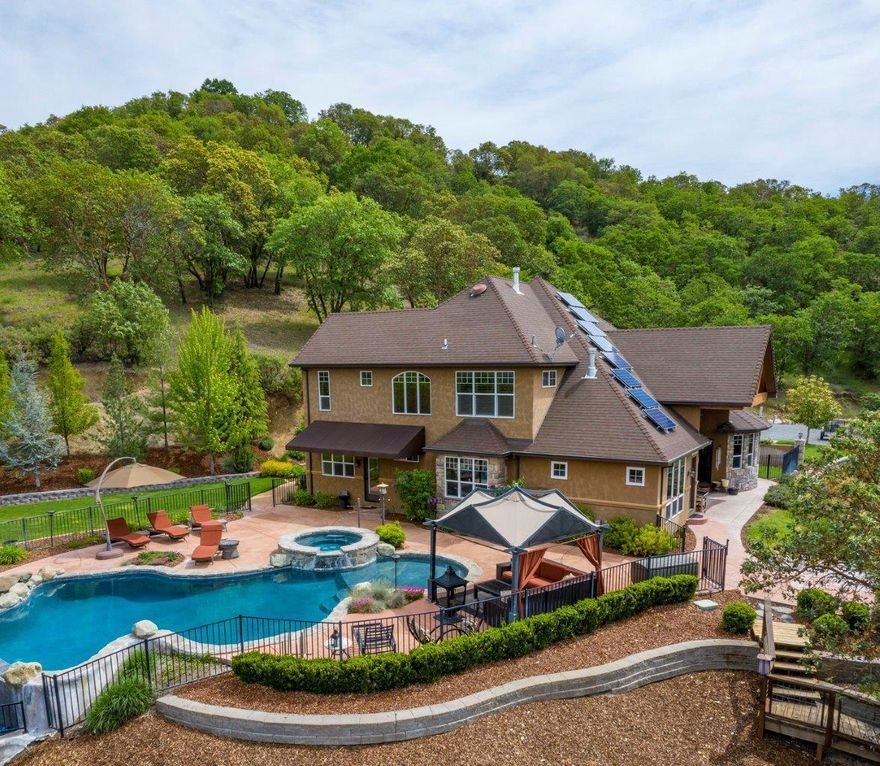 Forested hillside provides optimum privacy and unparalleled views. These two, one-of-a-kind, one owner, custom-built homes, are bundled together; providing extraordinary value and a truly unique living opportunity! Main home offers an open floor plan, Master suite on the main level along with a second master- both feature outside entrances. Outdoor living: enjoy a vanishing edge pool, gazebo, oversized umbrellas, hot tub and valley views! Only a short stroll down the bridge to a Treehouse Masters treehouse that makes the ultimate 487 sqft guest house! Back up to the house which is 4524 square feet with 4 bedrooms, large office, open kitchen, dining and living room. Up the winding stairs and down the landing are the other two bedrooms, full bath with double sinks, exercise and a game room. Three car finished garage, landscaping and lighted pathways! Here is a 28.18 acre estate with a gated entry in a fantastic Southern Oregon location!