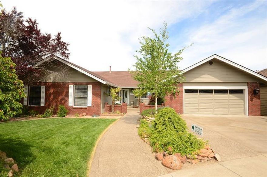 Wow! Beautiful East side, view home for $123.57a sq ft!! PLUS, this remodeled home offers an additional 433 sq ft workshop with heating and a/c not included in the square footage. Large kitchen w/granite counters, new appliances with double ovens, gas cooktop, large walk in pantry & island open to living room & views! Nice hardwood floors in kitchen. Breakfast nook & formal dining rm. Large master w/brick fireplace & sitting area & slider to covered deck. Double sinks & nice walk in closet w/ built-ins. Great family room w/ French doors to nice patio and flat yard. Beautiful landscaping w/ walkways. 2nd family room & game room.