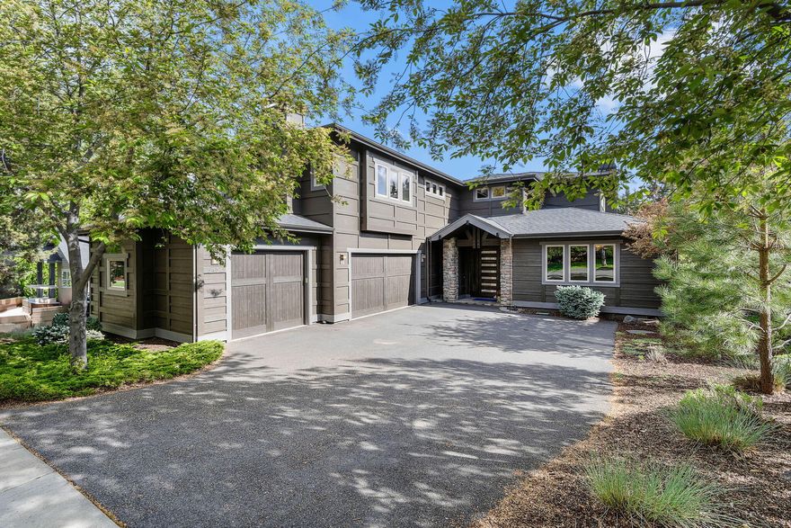 Welcome to this beautifully maintained home in the desirable Awbrey Park neighborhood! Tucked away on a quiet street near parks and trails, this home offers comfort, space, and natural beauty. The two-story living room features dramatic floor-to-ceiling windows and abundant natural light. The open main level includes a wonderful chef's kitchen with ample counter space and wraparound bar seating for entertaining. New refrigerator and microwave have just been installed. The spacious office provides a great place for those that work from home. Upstairs, the primary suite offers a private balcony, generous closet, and beautiful walk-in shower. A separate wing of the home has two additional bedrooms off of a second living area, providing privacy and flexibility for family and guests. This home has been very well taken care of - new paint, windows and more. Pride of ownership shines through and it is truly move-in ready. Call today for a tour!