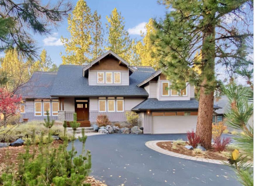 Discover luxury living in Awbrey Glen, one of Bend's most sought-after gated golf communities. On the 6th tee box, this stunning home blends elegance, comfort, and the Central Oregon lifestyle. The great room features beautiful hardwood floors, vaulted wood ceilings, custom built-ins, and large windows filling the space with natural light and golf course views. The modern kitchen offers a 6-burner gas cook-top, large island, and ample storage, perfect for entertaining. The dining area flows seamlessly into the kitchen and great room. The main-level primary suite includes vaulted wood ceilings, dual sinks, a walk-in shower, and spacious closet. Outdoor living shines with a covered wood-ceiling patio. The garage has a bonus area w/ workbench and cabinets providing excellent storage. Embrace luxury home living, outdoor lifestyle, and premier Bend amenities. Listing agent is related to the sellers.
