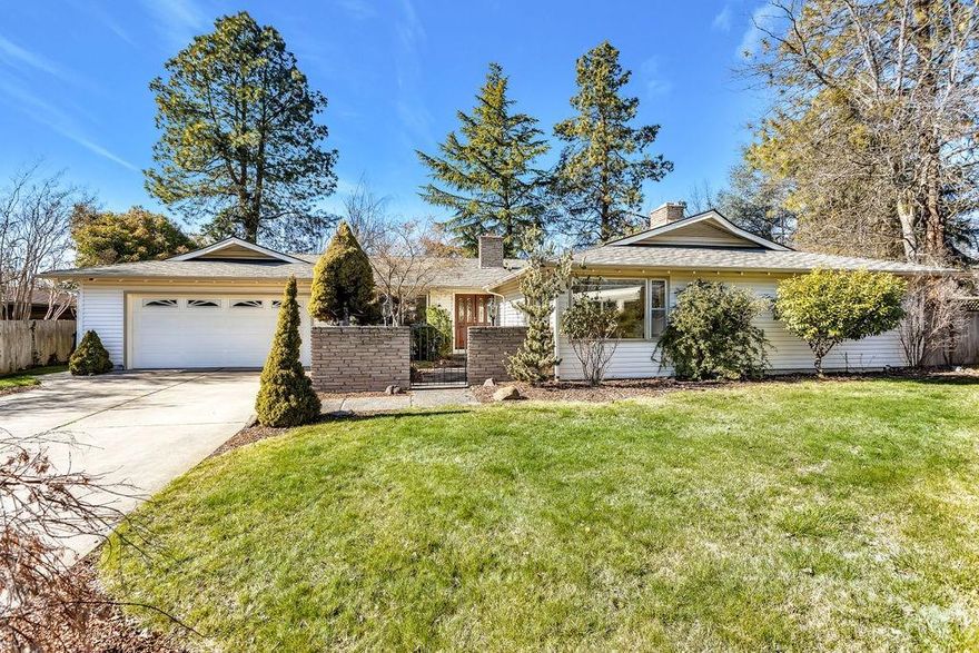 Single level home with beautiful in-ground pool. Immaculate E. Medford home, located in a cul-de-sac on .33 of an acre. This home features 4 bedrooms, 2.5 bathrooms, separate living & family room, 2 dining spaces and newer flooring. Spacious kitchen offers new 5 burner glass induction cook-top, double ovens, dishwasher, fridge & corian counters with breakfast bar. Living room has large windows and a wood burning fireplace. Enjoy the family room with wood burning fireplace and which leads out to the large back covered patio. One of the bedrooms is being used as an office/den. Large master bedroom has 2 closets, attached master bathroom with separate vanity area. Wonderful laundry room w/great cabinetry. Home has built-in ceiling speakers & abundant storage. Private backyard is an entertainers dream: sparkling in-ground pool, mature trees, large lawn area & garden beds. Pool shed w/outdoor mounted stereo speakers & pool equipment. Close to RVCC golf course, hospital, parks & schools.