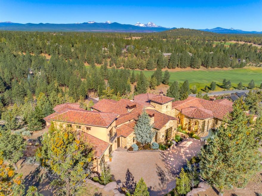 Being sold fully furnished!! Offering unbelievable detail to craftsmanship and 2018 innovation with newly updated lighting and home audio & visual programming systems. Enjoy stunning views of the entire Cascade Mountain range from every room! Complete with an expansive gourmet kitchen with butler's pantry and two built-in refrigerators, open great room with limestone fireplace and Cantera windows for absorbing the incredible views, an elaborate master suite with intricately detailed limestone fireplace and his & her bathrooms, nanny's quarters, office, theater and more. Heated flooring through the home and motor court/driveway for no worry winters. Everything for the buyer that wants old world craftsmanship in a mountain home!