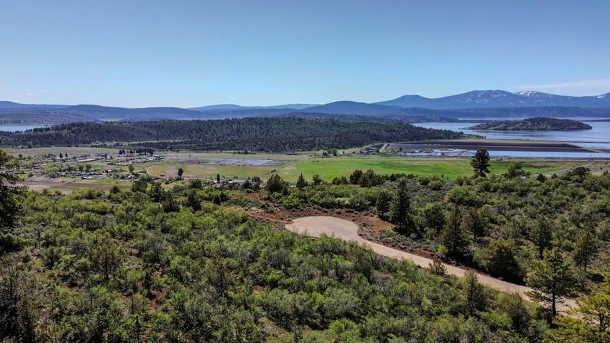 Build a home with a view of your dreams on this 5-acre corner lot, nestled in the southern section of Paradise Hills Subdivision, a gated community just north of Klamath Falls. This lot, located on a paved cul-de-sac, offers a potential build-site for a home with beautiful mountain views or a view of Klamath Lake.