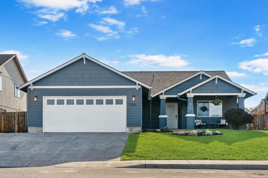 Welcome to 2206 NW 8th Street, a well cared for single level home in one of Redmond's established neighborhoods. Surrounded by mature trees and located just minutes from the Dry Canyon Trail, this home offers both comfort and convenience. Inside, you will find three bedrooms, two bathrooms, vaulted ceilings, updated flooring, new blinds, and fresh interior and exterior paint. The layout features both a living room and a family room, offering plenty of space to entertain or relax. The oversized primary suite provides a quiet retreat, and the gas fireplace adds warmth and charm. The fully fenced backyard is ideal for play, gardening, or pets, and there is RV parking plus a two car garage with extra storage. This is a great opportunity to own a move in ready home in a desirable location with easy access to schools, parks, and everything Redmond has to offer.