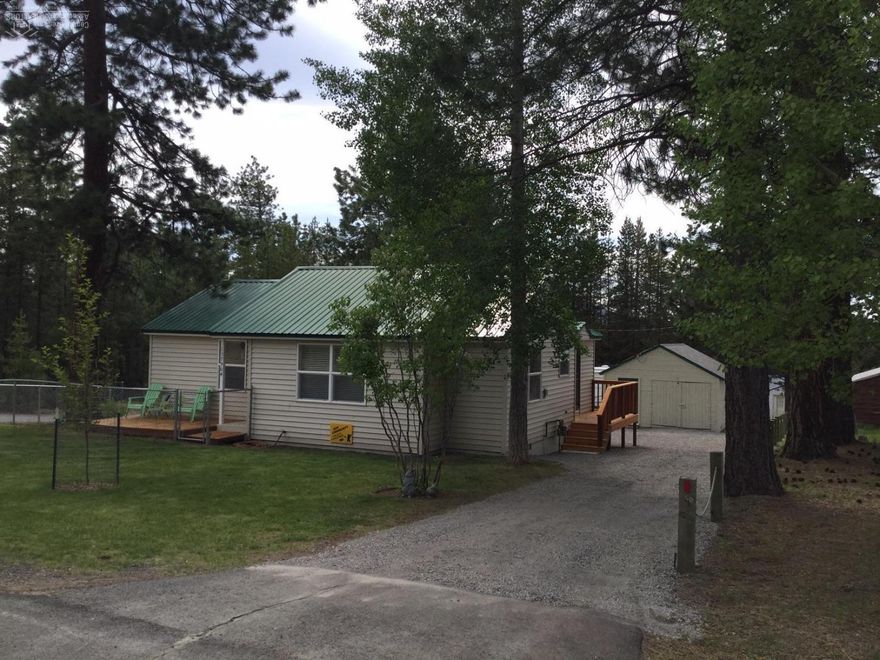 Move in Ready 2 Bedrooms 1 Bath Frame Home in Gilchrist Townsite. Home is very well kept, 856 Sq Ft with many updates throughout. Just recently remodeled bathroom, upgraded gas furnace, fenced corner lot, RV parking and detached garage. Home views the Forest and is in walking distance to the School, Store and Post Office.