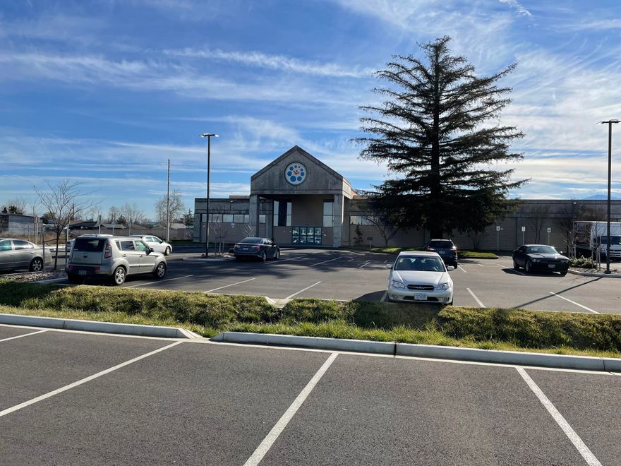High Traffic Commercial Location in West Medford.  ~16,137 sf building, originally built for the Moose Lodge.  Has housed a child development center. Original build had many amenities (Commercial Kitchen; Ballroom) that are still in place.   Building construction would allow the building to be modified to a more retail-oriented facade.