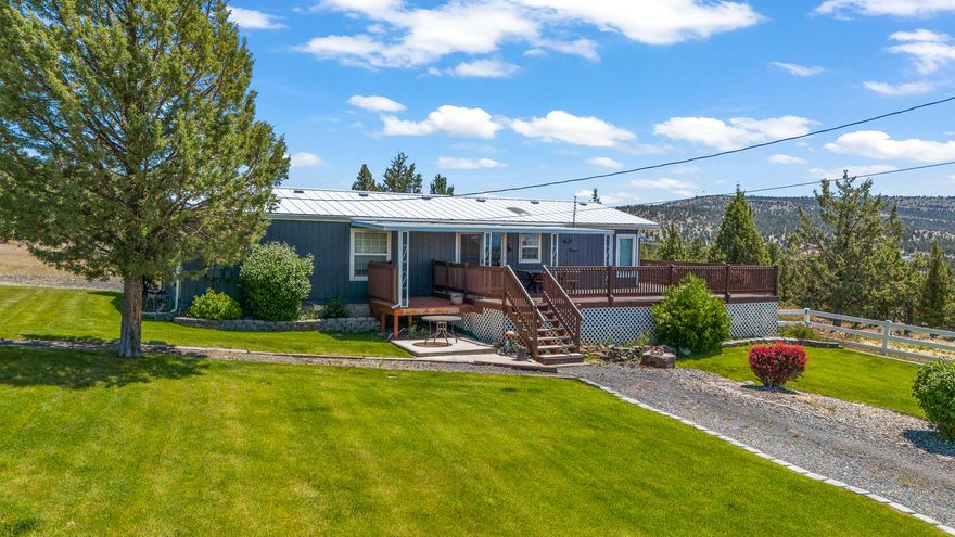 SELLER IS MOTIVATED! Discover the perfect blend of space and functionality with this charming, well maintained 3 bedroom, 2 bathroom manufactured home built in 1995, situated on 26.28 acres. Featuring a 2 car garage, RV cover, and a 1728 sqft 2 bay shop with concrete floors and power, this property is ideal for those needing extra storage or workspace. With 2 tax lots, the land presents and exciting opportunity. Whether you're looking for room to spread out or a unique property with endless possibilities, this could be the one for you! Buyer to do due diligence.