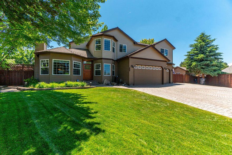 Everything you're looking for & more! Nearly 4000 sf of living space on .31 acre. Situated on a culdesac in a quiet SE neighborhood of homes on larger lots, the property welcomes you w/ an expansive paver driveway, 3-car garage & RV parking. The spacious main floor includes 2 living spaces w/ FPs, 2 dining areas, full bath, office & gym. Gourmet kitchen complete w/ floor-to-ceiling custom cabinets, slab granite counters, 6-burner cooktop, double ovens, pantry & separate bar w/ sink. Upper level offers 4BRs, 2 full BAs & an impressive entertainment room w/ built-ins & bar area. Primary suite features a spa shower, soaking tub, dual closets & a beautiful 2-sided FP. Designed for large-scale entertaining, the backyard features a custom kitchen, water feature, sport court, play structure, hot tub & an entertainment gazebo complete w/ TV, sound system, FP & heaters for crisp fall evenings! Fenced flat lot w/ flower garden & storage shed. A must see blend or comfort, luxury & functionality.