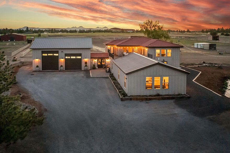 Welcome to a stunning 34-acre estate where luxury living meets premier equestrian amenities & breathtaking Cascade Mountain views. The impeccably crafted 4,357 sq ft home has elegant finishes & thoughtful design throughout. It offers 5 bdrms, 4 baths, including two spacious primary suites. Enjoy the gourmet kitchen, open floor plan, vaulted ceilings, mudroom, pantry, & more. The main-level primary features a luxurious bath with soaking tub. Perfect for horse enthusiasts, there are 22 irrigated acres, with sought after COID water rights, two ponds, a 7-stall barn with tack room & wash rack, two outdoor arenas, a 60' round pen, 10 paddocks, hay shed, & welded pipe fencing. Ride directly onto miles of BLM land and endless trails. Power & water extends to dry lots and pastures. There is also potential for multigenerational living. This is Central Oregon equestrian living at its best.