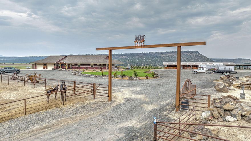 This small ranch has a convenient location that offers a quiet country setting, yet locatedjust minutes from downtown Prineville & less than an hour from Bend, The nearly 3,491± square foot, single level custom home, built in 2018, overlooks the Crooked River Valley, farm fields & wide opem pastures below. This beautiful homes features an expansive master bedroom, huge great room, stunning kitchen, a large den (perfect office or extra bedroom), big pantry, mud room, wet bar, large coverd patio & barbeque area, hot tub, pool, and gorgeous landscaping. High end finishes are noted throughout this home, including hardwood floors, granite countertops, a copper farmhouse sink, alder cabinetry & stainless steel appliances. Spoil your horses from the nice horse barn that offers 6 stalls, each with large runs. The horse barn features and oversized tack room, outside wash rack & hay storage. The property includes a 3 bay shop, 270'x150' outdoor roping arena, 2 turnouts for cattle & more!