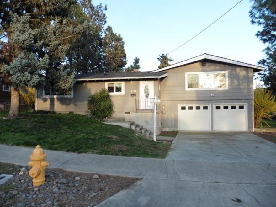 Located on a quiet street in sought after East Medford and is located conveniently close to shopping and schools. The home offers multi-levels with 4 bedrooms and 2.5 baths. The back yard offers a spacious deck and large fenced yard.