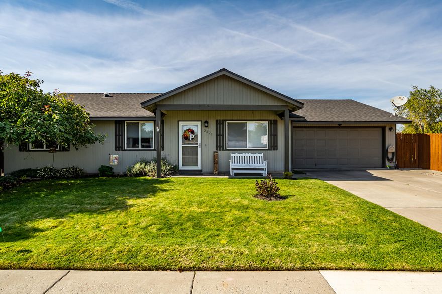 Very Clean, nicely updated single-level home on corner lot in SW Redmond. Vaulted ceiling, solar tubes, ductless heat pump.  Seller installed laminate flooring, new water heater, cellular blinds, pantry in kitchen, freshly stained fencing, ceiling fans in each bedroom.  Kitchen cabinets are freshly painted.  Fairly new are roof, siding, Kitchen counters and bath upgrades. Beautifully landscaped front and back yards with mature trees/shrubs and sprinkler system.  Nice 8' x 10' storage shed, over sized 560 sq ft garage, covered front and back patios.  Washer and dryer hookups are both in house and in garage.  This home has been well cared for.  Seller is including the portable kitchen island, all kitchen appliances as well as front load washer & dryer and the patio furniture and umbrella.