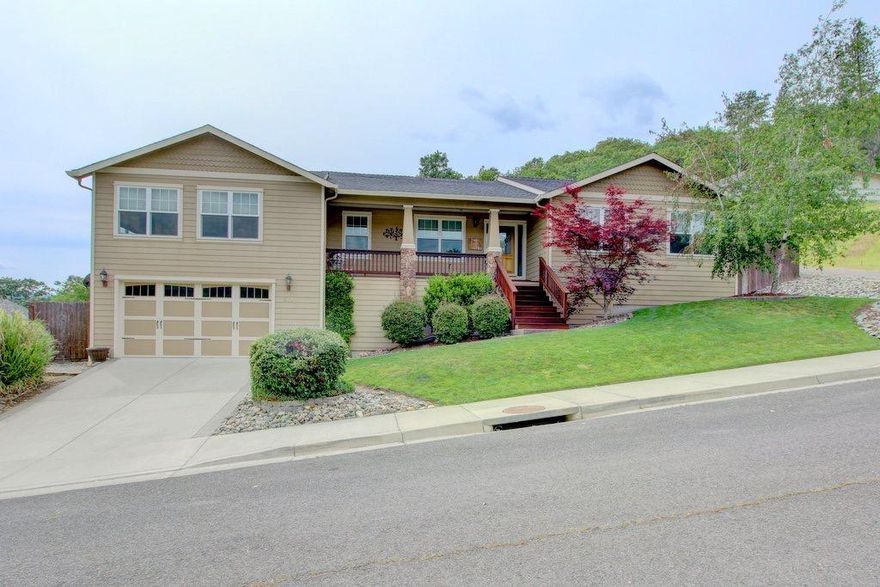 Elegant Rogue River home at the end of a quiet cul-de-sac. Luxurious Maple flooring & Berber carpet throughout. Breathtaking views from every window in the home with Hunter Douglas window coverings for privacy. Vaulted ceilings in the Greatroom with a Marble Fireplace for those cold nights. The Kitchen boasts of Tile Counter tops, Gas Cooktop Island with downdraft, Eat In Bar and a Separate Dining area. There is also the bonus of an open Office with stunning Mountain Views. Separate large Family Room with vaulted ceilings and the best views in the home. Secluded Master Suite with 3 Generous sized Closets and Sitting Areas, a Jetted Tub, Double Sinks & Separate Shower. For your outside enjoyment, there are Mahogany Decks in both the front and backyards with a Gazebo on the Rear Patio. Finished 2 car garage has a brand new Custom Garage door with a commercial grade side mount door motor, additional Workshop and storage areas. Many more upgrades; Professional Landscaping, Central Vacuum