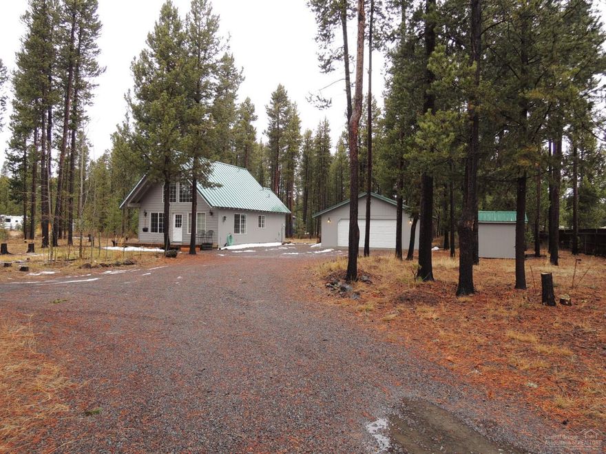 The Cabin you have been looking for on 1 Acre W/2 Car Detached Insulated Garage. Close to La Pine State Park, Boat Ramp, BLM, Cascade Lakes & Mt Bachelor. Newer Ext/Int Paint, Hand Rail, Faux Cement Floors, Granite Counter Top in Kitchen W/Updated Sink & Faucet. Vaulted light & bright living space. Bedrm down W/Walk In Closet. Bathrm W/Tile Shower. Loft W/Walk In Closet. F/A Electric & Propane FP. Utility Rm W/Eco Water Sys. Metal Roof, Fire Pit, RV Parking W/Power & H2O. Storage Bldg. Ext Hot/Cold Faucet.