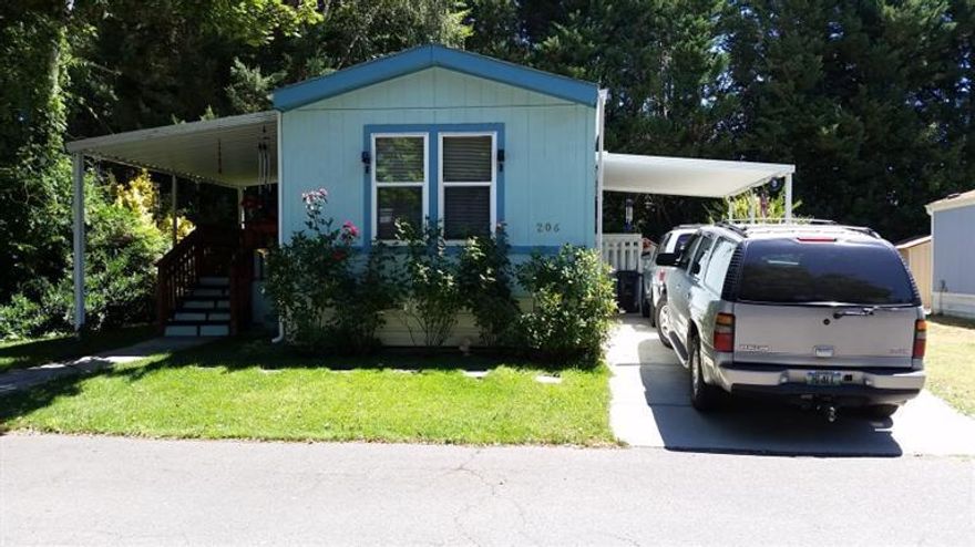 This 1992 Mfg home is priced well below Josephine Co. Tax real market value of $20,100 (RMV), excellent condition. On .17 acre lot (you are buying a MFG home only, land is not included. Water, sewer, trash included, adjusted to $400/mo. in Sept 2014. Had whole house inspection Aug, 2014, all items on report have been repaired. Has T-111 siding and compostion roof. Newer F/A condensor, nice appliances including new smooth top R/O. Hardwood floors (not laminate) 7 years old (Kit & Dining)areas. One car parking under attached carport, second car parking in driveway (not Covered). One Pet Ok, must be under 35lbs, ok to put up fencing if needed with park approval. Family park but most residents are age 55+. The park fronts the Rogue River, a easy walk for fishing, kayaking or ? Nice country feel, about 2.5 miles to city limits. Has Dish TV and Charter high speed internet cable installed. Buyer needs to be approved for park residency by Park owner. Easy to show, see agent remarks