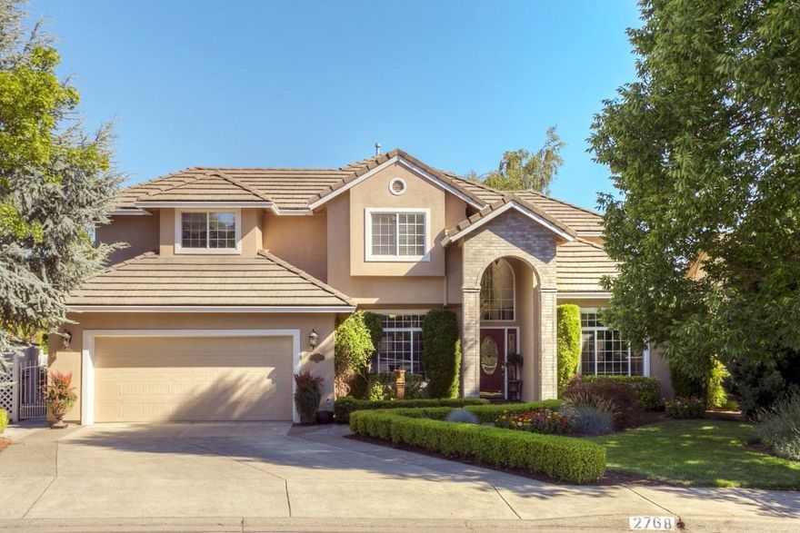 This is one of the most strikingly beautiful homes (inside and out) on this gorgeous street! Everything about this home says, quality and functional design! The curb appeal with its mature landscaping should capture your interest and the rest of the home will just add to it! And it's located in the desirable Lone Pine School District! Features include: grand entry, formal dining and living room, office/den, wood, travertine and carpeted flooring, kitchen island with breakfast bar, granite counters, pantry, stainless appliances, gas fireplace in the family room, nice sized master bedroom with soaking tub, walk-in closet and balcony with views of the mountains, upstairs bonus room/4th bedroom/theater room. The landscaping is lush with two beautiful water features (front and back), covered back patio and so much more!! This is a special home!!