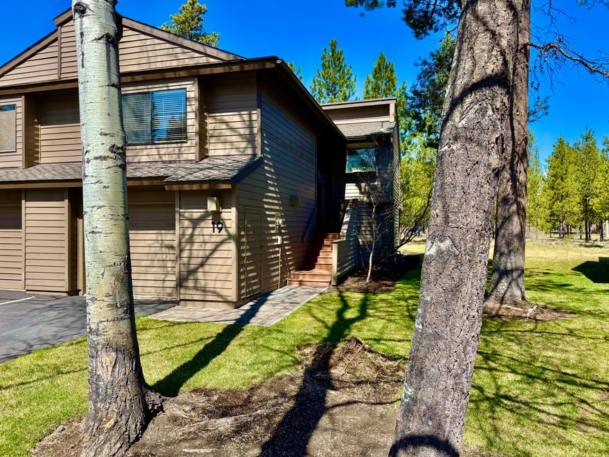 Tucked among the serene pines of Sunriver, this turnkey 3-bed, 2.5-bath condo offers the perfect blend of comfort and adventure. The vaulted great room features a cozy wood-burning fireplace and large windows overlooking beautifully maintained park-like grounds. The kitchen offers ample counter space, a breakfast bar, and flows to a private upper deckâ€”perfect for coffee at sunrise or unwinding at sunset. The main-level primary suite includes an en-suite bath and generous closet space. Downstairs, two bedrooms offer room for guests, a home office, or bothâ€”with direct patio access to enjoy the fresh mountain air. Located in Fairway Village, just steps from the Woodlands Golf Course and 40+ miles of bike paths, plus a private pool for owners. Only minutes to The Village at Sunriver and 20 miles to Mt. Bachelor, this fully furnished home is ideal as a full-time residence, vacation retreat, or rental. Come experience the magic of Fairway Village!