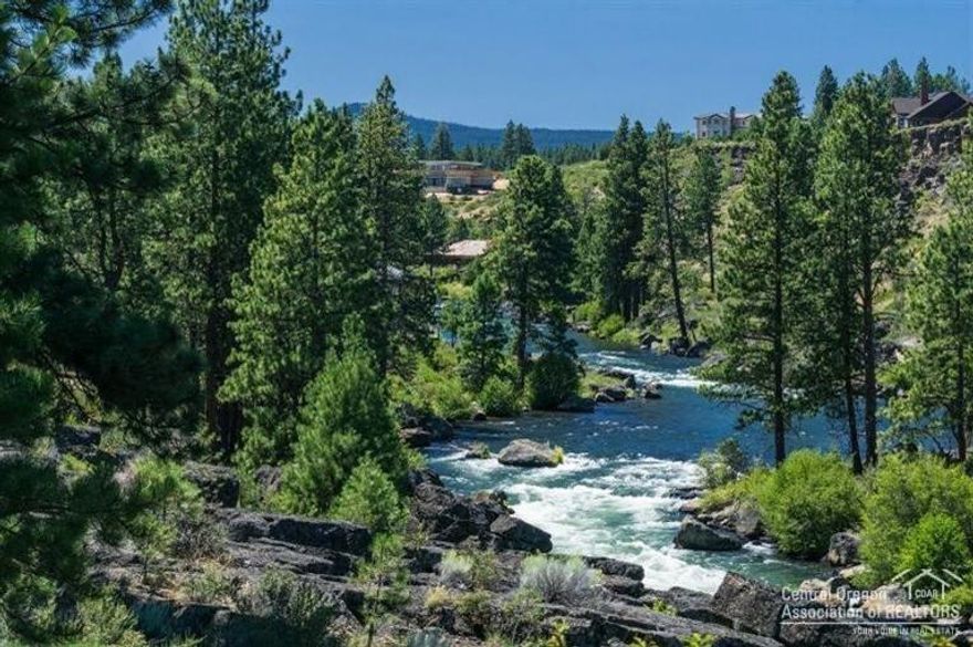Stunning views of the river on this 4 private acres in the heart of Bend Oregon. A unique opportunity to create your private oasis for years to come in this truly one-of-a-kind location. Build your dream home while you live in the 2 bedroom, 2 bath vintage home that offers over 300 ft of river frontage. Enjoy views of the wild & scenic section of the river above the irrigation flume. Private gated access, and located within the Bend City limits near the Old Mill.