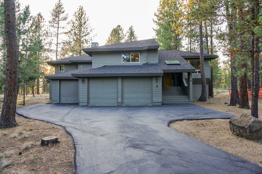 Sunriver home for sale. Reverse living , complete with expansive upper deck , with stamped concrete lower deck. Large 3 car garage. Laundry on both levels. Spacious second living/ game room.  Granite counters , hardwood floors and oversized tiles on bathroom counters and floors.   Kitchen with large walk in pantry is open to dinning area and Living Room. 3 master bedrooms ,Main master with French Doors on to the deck. His and her closet  Second laundry is in the master bathroom., with beautiful soaking tub and walk-in shower. 50 year roof installed in 2017 . Custom architecture and design by Northwest local favorite Don Mackprang. (Existing and Addition.)
Wine Closet,
Double oven,
RIng,
Nest,
Storage closet in garage,
Refrig and Dishwasher in laundry room,
Storage for canoes and kayaks
Pump that moves hot water quickly to 2nd floor.
Hot tub space is hot tub ready