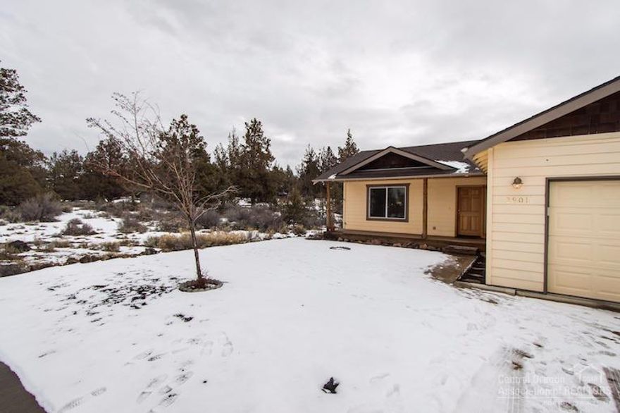 Open airy great room with vaulted ceilings and lots of light in this wonderful single story home. Wide cedar front porch with end of street quiet. Beautiful newly landscaped backyard. A/C and oversized 2 car garage for all your toys.