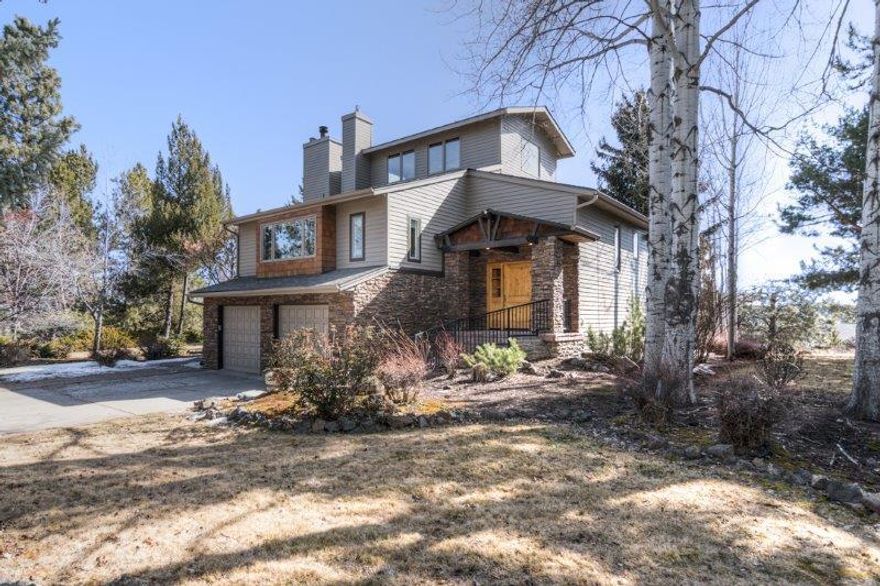 Lovely southerly view lot of .69 acres in the highly sought after Westridge neighborhood near the Athletic Club of Bend. Spacious home with 3 bedrooms, 3 baths, family room, huge bonus room, with a chef's kitchen with granite and stainless steel. Master on the main level, recently remodeled with a walk in closet and ensuite bath. Wonderful guest area/office/den upstairs is currently used as a fourth bedroom. Enclosed office/library off of the living room makes working from home an easy choice. Two bedrooms, one bathroom, family room, and huge laundry room downstairs provides for privacy for the entire household. Several options for cozying up in front of a fireplace-both gas and wood burning throughout this home! Enjoy outdoor dining on the large deck with easterly views to Pilot Butte and overlooking the beautiful landscaping and trees. Homes like these don't come on the market very often!