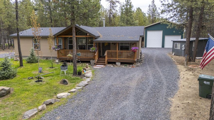 Immaculate and barely lived in Energy Star home that has been thoughtfully upgraded. Situated on a private acre w/ mature trees you'll feel like you're on vacation everyday. Enjoy the open floor plan featuring an oversized kitchen w/ soft close rustic hickory cabinets and rounded crescent edge countertops. Enjoy natural light w/ large windows and get cozy on chilly nights w/ the wood fireplace. Rafters have been doubled up to help w/ snow load, this is a place you won't have to leave for winter. The shop has 14 and 12 ft insulated roll up doors. Enjoy the greenhouse to plant whatever you want to keep away from the critters. There is an extra structure that is used for storage but could be built out for extra living quarters. Septic is an Advanced Treatment Technology (ATT) system which is modern solution for wastewater management. Private well has a variable speed pump and producing 20gpm when tested. This property is efficient and beautiful, don't miss out on this special place!