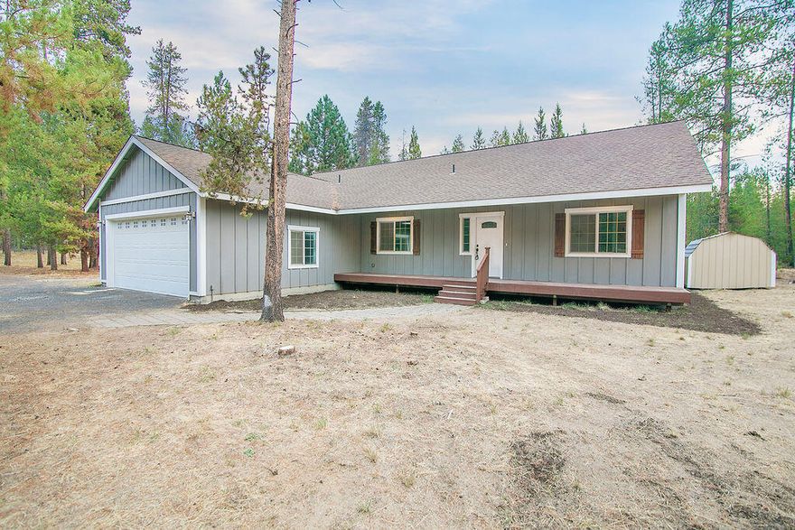 La Pine -- Secluded & Private -- Updated/Remodeled --  1 Level -- 1.36 Acres -- 1910 Sqft -- 3 Bedroom / 3 Bathroom -- Living Room -- Kitchen w/ Stainless & Quartz Plus Large Walk-in Pantry -- Dining Area -- Primary w/ 2 Walk-in Closets & Full Bath / Soaker Tub -- Jack & Jill Bathroom for Bedroom 2 & 3 -- Office / Den Room -- Laundry Room -- Bonus Storage Room -- Woodstove -- Heat Pump & A/C -- Vaulted -- Skylight -- NEW Laminate Flooring Throughout -- NEW Interior & Exterior Paint -- NEW Fixtures -- Vinyl Windows -- Double Garage -- Outbuildings -- 2 Decks Front & Back -- Trees -- RV Parking -- Dead End Street --  Circular Driveway