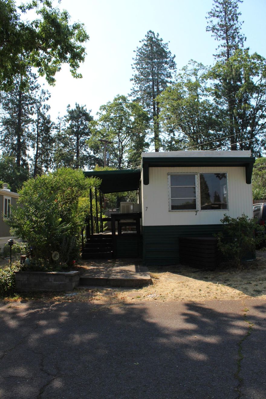 Cute and Quaint 2 bedroom, 1 full bath mobile in an all age park.  Home has a gas furnace forced air, window A/C unit, laminate flooring, carpet in bedrooms.  Bathroom offers a tub/shower combo.  Fridge and range/oven included.  Nice covered front Porch for outside living with small yard area.    Park has onsite laundry facilities and check with park for pet policy.  Mobile is being sold as-is.
 ___________________________________________