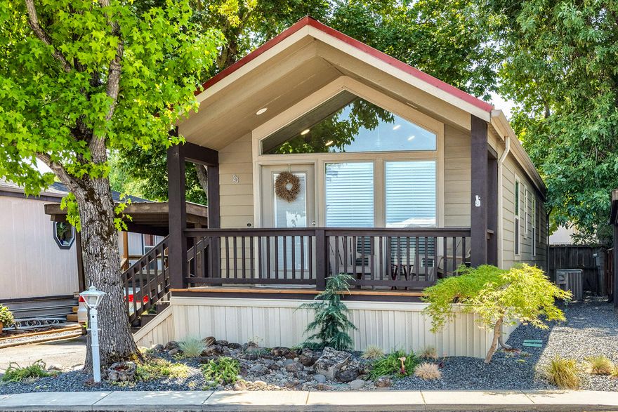 Unique Value Opportunity in Historic Jacksonville. Built in 2017 this lovingly maintained home offers modern comfort, efficiency, & charm at every turn. An inviting front porch welcomes you to a light & bright interior with vaulted ceilings & a well-designed layout that creates an open airy flow from the kitchen—complete with ample cabinetry—to the great-room living area. Clean, comfortable, & vaulted primary & guest bedrooms, spacious bathroom, utility nook (washer/dryer included), all easily accessible by an exterior ramp to side door entry. Enjoy a peaceful/private side yard patio, easy-care yard, storage shed, carport, & paved off street parking. Located at the entrance to Jacksonville, Royal Mobile Estates is a quiet, sought-after 55+ community where country charm meets small town convenience. Amenities include a beautiful clubhouse w/outside patio area, covered mailbox station, open space parks/paths/pond/benches, utility building w/laundry, & RV storage for an additional fee.