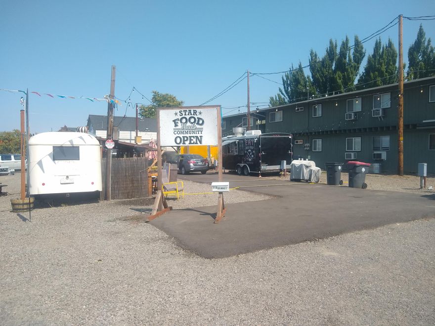 Prime commercial opportunity in a high-traffic location adjacent to the Medford Center and Tinseltown Theater! Currently operating as a vibrant and profitable food truck court, this versatile property offers immediate income potential and long-term development possibilities. Strategically situated with excellent visibility and easy access, the lot is equipped with essential infrastructure including electrical hookups, water access, shaded seating areas, and ample parking. Surrounded by vibrant residential neighborhoods and local businesses, this site draws consistent foot traffic and community engagement. Whether you're an investor looking to continue the popular food truck venue or a developer seeking a flexible site for retail, mixed-use, or other commercial projects, this property is a rare find. Zoned C S/P, Commercial Service Professional, with potential for expansion or redevelopment—don't miss your chance to own one of the most active cornerstones of the local dining scene!