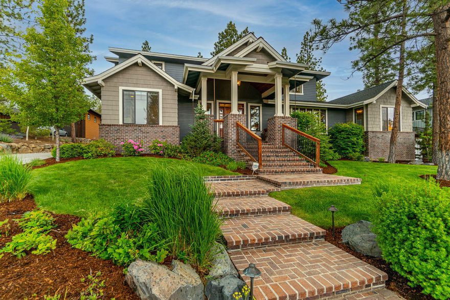 Spectacular traditional brick meets northwest craftsman in this stately home in Shevlin Ridge. On a quiet cul de sac with stunning curb appeal, this home excites from the outside in. Upon entry, the home feels grand as 12 ft ceilings & an abundance of windows welcome you. The great room with remodeled kitchen is both spacious and inviting and the multi-slide doors to the patio create the perfect opportunity for indoor/outdoor living. Retreat to the primary bedroom on the main to relax & unwind in the luxurious marble bath with custom walk-in closet. A light & bright office plus ensuite bedroom on the main provide a sanctuary for guests. Upstairs you will find two ensuite bedrooms with walk-in closets and a generous bonus room. Mudroom with storage lockers, huge walk-in pantry and a laundry room with folding table make for an organized & functional home. The oversized garage fits all of your toys and gear & much more! Don't miss this unique home filled with class and traditional charm.