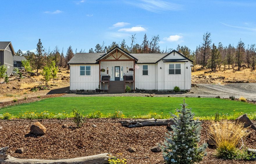 Newly constructed single level home in NW Redmond with an attached ADU/guest suite. The heart of this lovely home, the kitchen, has generous counter and storage space, stainless appliances, farmhouse sink and a large island to gather with family and friends.  Floorplan wise, the vaulted great room boasts a wood burning stove and adjacent dining area.  The primary suite has a separate wing from three of the additional bedrooms while sharing an office / workout room on the same side of the home.  Primary bathroom carries the classic farmhouse style with subway tile, a soaking tub and tiled shower.  The south side of the home houses two additional bedrooms and a fully contained studio or third bedroom suite.  The studio has dual access from both the driveway and if preferred, through the home.  Thoughtfully designed the one acre lot has an attached two car garage, fenced yard and a covered back dining area. This immaculate property has been well cared for and is ready for the next owner.