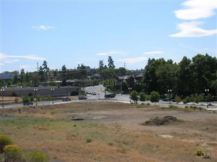 The most exciting development site in the City of Bend. Gateway property, located at the north entrance to downtown with easy access to the Parkway & downtown. Highly visible from the Parkway. Much of the off site work has been completed with the building of a new intersection. Site has been cleared & graded. Commercial zone with a wide variety of approved uses. Zoning allows for 55 ft maximum height. City is open for creative ideas, public/private partnerships.