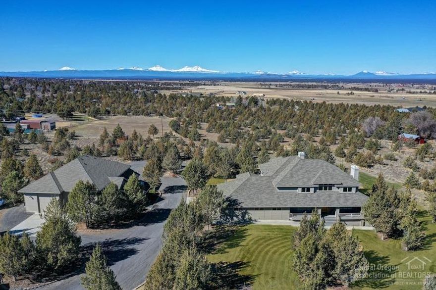 7900+sf Custom Home on 5 Acres with Dream Shop! Incredible 4Bd/4Ba (Plus a FULL Bath in Shop!) boasting Cascade Mtn Views, Great Room w/gas log stove, gourmet's kitchen w/B-Bar Island, SS appl, B-nook, Front room w/gas FP, dining room, 10' ceilings, Big Master w/Views, big walk-in, jetted tub + dbl tile shower, Huge family/rec room downstairs w/full bath & bonus room/office, 3 zone High Eff FA Heat & Central AC system, 3+ att garage AND detached 3000sf (50x60) custom shop w/2-drive thru RV bays, Full Bath, and Heated & Cooled!