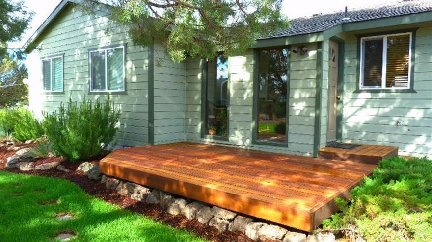 Charming home in the country on two+ acres with gorgeous Cascade Mountain views. Move-in ready! Many upgrades to home: new septic tank in 2015, new furnace in 2005, new cabinets, all new windows in 2005, new roof in 2006, hardwood and tile floors, slate entry, heat pump, newly refinished decks. Wonderful landscaping and in-ground sprinklers. Great neighborhood with quiet paved streets and BLM access for biking, walking, jogging and horseback riding. Horses allowed. Only 14 minute drive to 27th and Hwy 20.