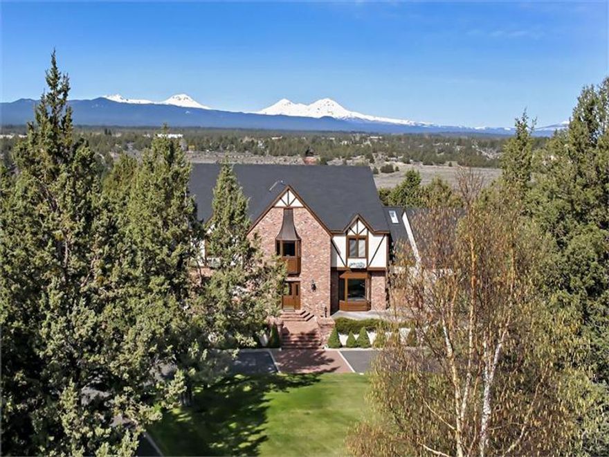 This home has been approved by Deschutes county to be a guest lodge. Your guest will be in awe pulling up to this stately looking Tudor home that offers amazing Cascade Mtn. Views. The convenient location between Bend, Redmond and Sisters is made even better by the fact that the west border of the property is Tumalo state park with access from the property. The well maintained home offers 8 bedrooms and 7.5 baths. The property is beautifully landscaped and there is a large heated shop to finish off the package.