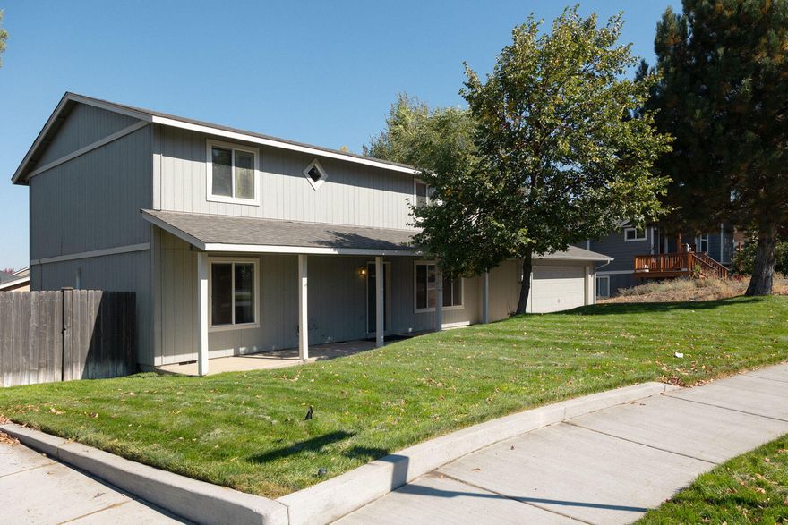 Beautiful move in ready 5 bedroom home located near SE Bend's amenities. Open floorplan with dual master bedrooms, including one downstairs. This home is clean and has plenty of updates including new flooring upstairs, updated master bathroom, mini splits for heat and a/c. With a fenced yard and a well maintained yard there's plenty of space for entertaining. Great location just minutes from shopping, parks and schools.