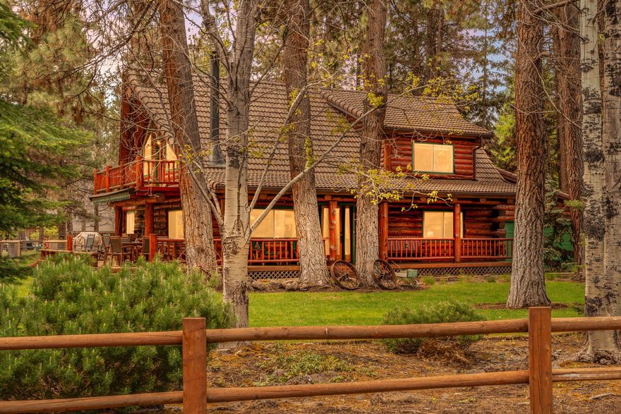 Fantastic condition, custom log home in desirable Sage Meadow. Interior features: High vaulted ceiling in main living and upper living area with log beams and tongue & groove; Open living floor plan; Wide-plank hardwood flooring; Solid Alder doors/casework; Remodeled kitchen with custom Cherry cabinets, farmhouse sink, and stainless appliances; Large eating bar with Blue Pine counter; Fireplace Xtrordinaire with river rock surround; Primary bedroom on first level with soaking tub, walk-in tile shower; Laundry/mud room; HUGE upper loft/living area with open railing and access to upper outdoor terrace. Exterior Features: Multiple covered/uncovered outdoor living areas; Fully fenced-in dog yard with fruit trees; High fenced-in raised bed garden area with internal drip system; Assortment of trees including mature Aspens and old growth Ponderosas; Attached garage with covered access to home; Large paved driveway; Tile/fiberglass roof; Extensive underground irrigation system; Buried propane