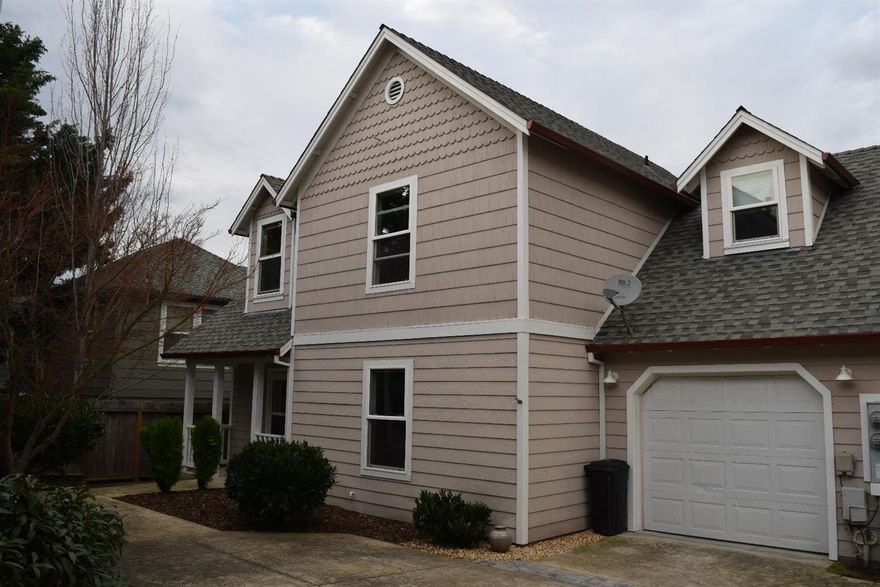 Beautiful Blackberry Lane town-home in a great Ashland location with views of Grizzly Peak, a short distance to Bellview Elementary School and SOU. Don't be misled by the bark in front and back, there is a full in ground sprinkler system. This town-home was built in 2000 and it features hardwood floors on the lower level with a nice cozy gas fireplace. With 3 good sized bedrooms as well as 2 large bonus rooms you'll have plenty of space in this freshly painted town-home. Come tour this quiet Ashland town-home located on a private road today.