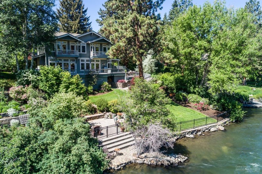 Spectacular property in outstanding location! Special riverfront properties like this do not become available very often. Expansive river views of 1st St. Rapids & Pioneer Park; property runs right down to river in quiet, old Bend neighborhood. Close to river trail access and a stone's throw from downtown. Extensive decking plus beautiful outdoor spaces with fire pits; has resort like feel. Home is well lit with windows on both levels maximizing river views.