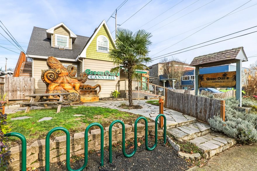 Located in Sellwood on SE Tacoma Street, this exceptional commercial property is offered together with an established cannabis retail business, presenting a rare opportunity to acquire both income-producing real estate and a turnkey operation. The property currently benefits from multiple revenue streams, including the ground-floor dispensary and a successful on-site food cart tenant. The downstairs is licensed for wholesale use, with the current owner intending to relocate wholesale operations to the garage area, creating the potential to convert the upper level into a residential unit or additional income-producing space (buyer to verify). Strong street presence, excellent walkability, steady traffic, and proximity to popular Sellwood shops and restaurants support long-term demand. With existing operations, rental income, and future expansion or reconfiguration potential, this is a rare opportunity to secure a high-performing asset in one of Portland's most desirable neighborhoods.