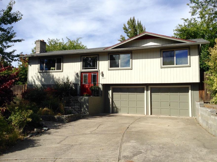 Ideal 4 Bedroom split-level home tucked away in a quiet cul-de-sac, with an amazing resort-like backyard! Beautiful kitchen complete with granite counters, new SS appliances, island with a built-in wine cooler, custom cabinetry and flooring. Cozy living room with a certified wood stove, nice picture window with views of Roxy Ann. Mstr bedroom has access to the covered deck, 2 additional bedrooms on the main level. All new interior doors! The lower level provides a family room with a fireplace and the 4th bedroom with a walk-in closet and 1/2 bath. Off of the dining area is access to the covered deck that spans the whole length of the back of the house, where you can enjoy the large private backyard that includes an In-ground Pool, pergola ready for a hot tub, mature landscaping and is fully fenced. Side yard includes raised garden beds. Come view it today!